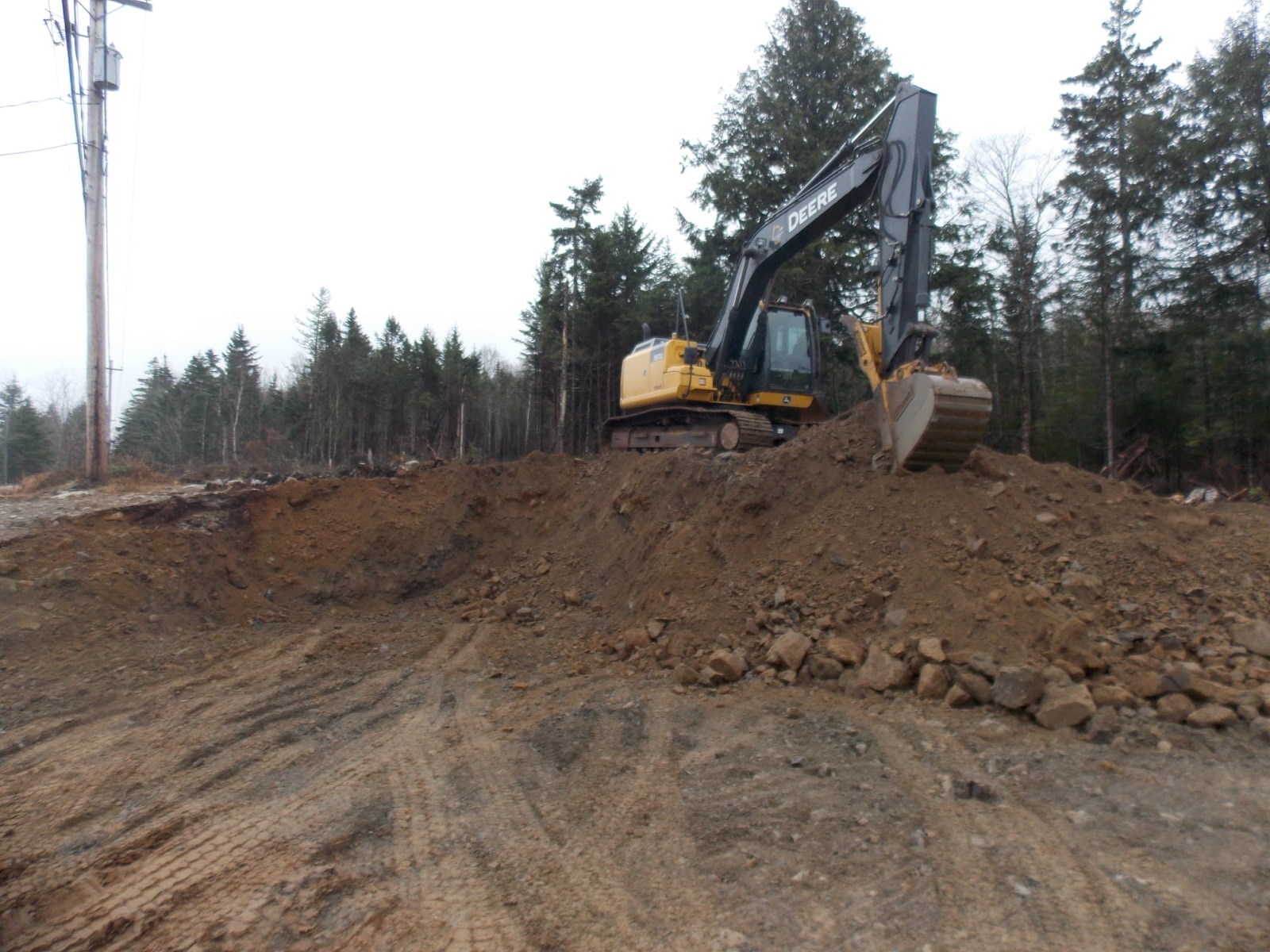 David R MacFarlane Enterprises excavator on a cleared site in Porters Lake area